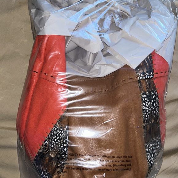 The sak large shoulder hobo purse brown/orange with a feather bird print - Picture 13 of 13